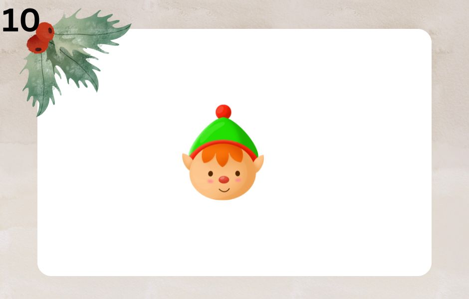 An emoji of a character with small features, pointy ears and a red and green Christmas hat.